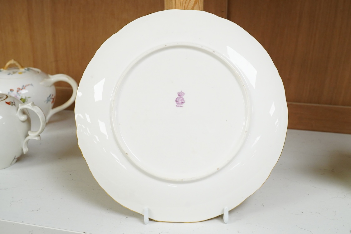 A Mintons yellow floral plate with tooled gilt border, 22cm in diameter